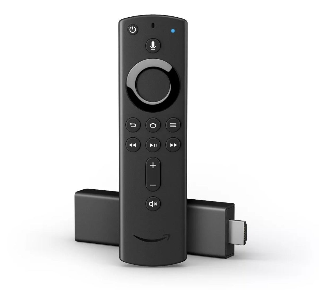 A black remote with a black arrow in front of a media stick