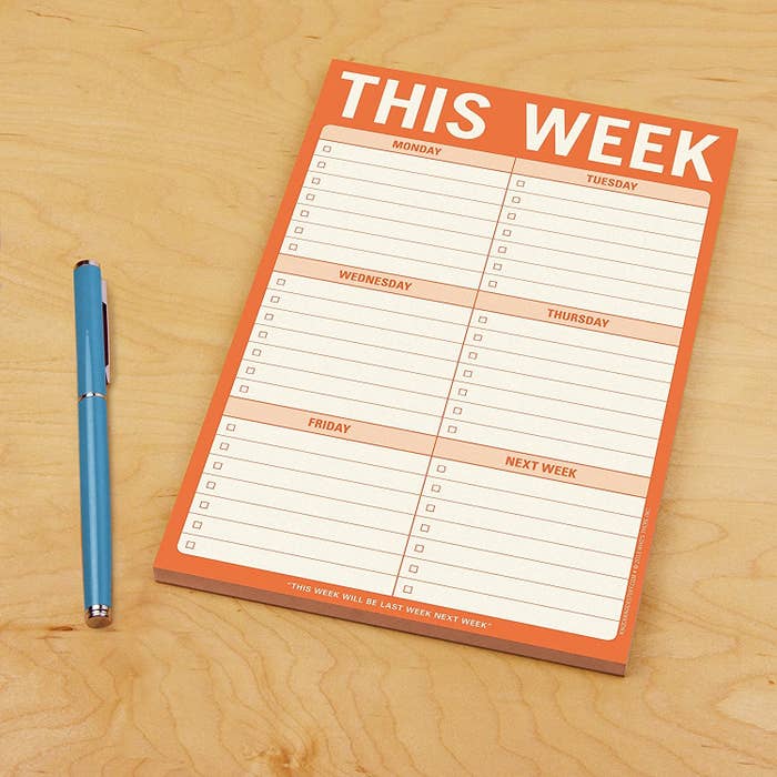 A notepad with space to write under for each weekday and next week's goals 
