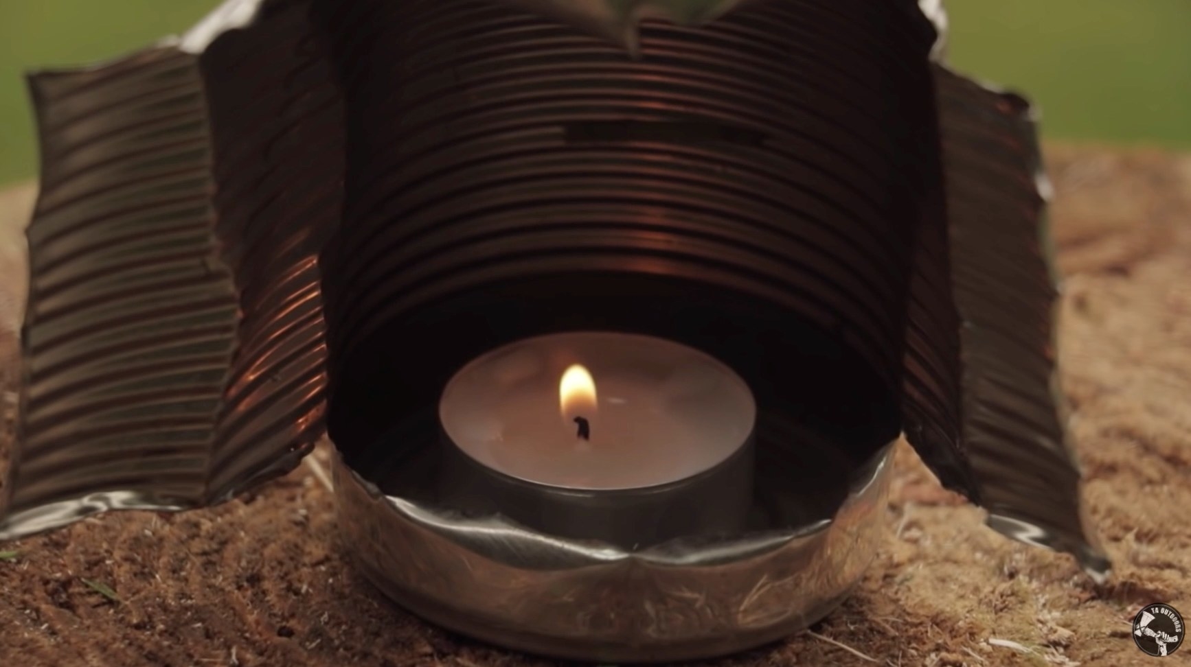 Candle holder made out of a can