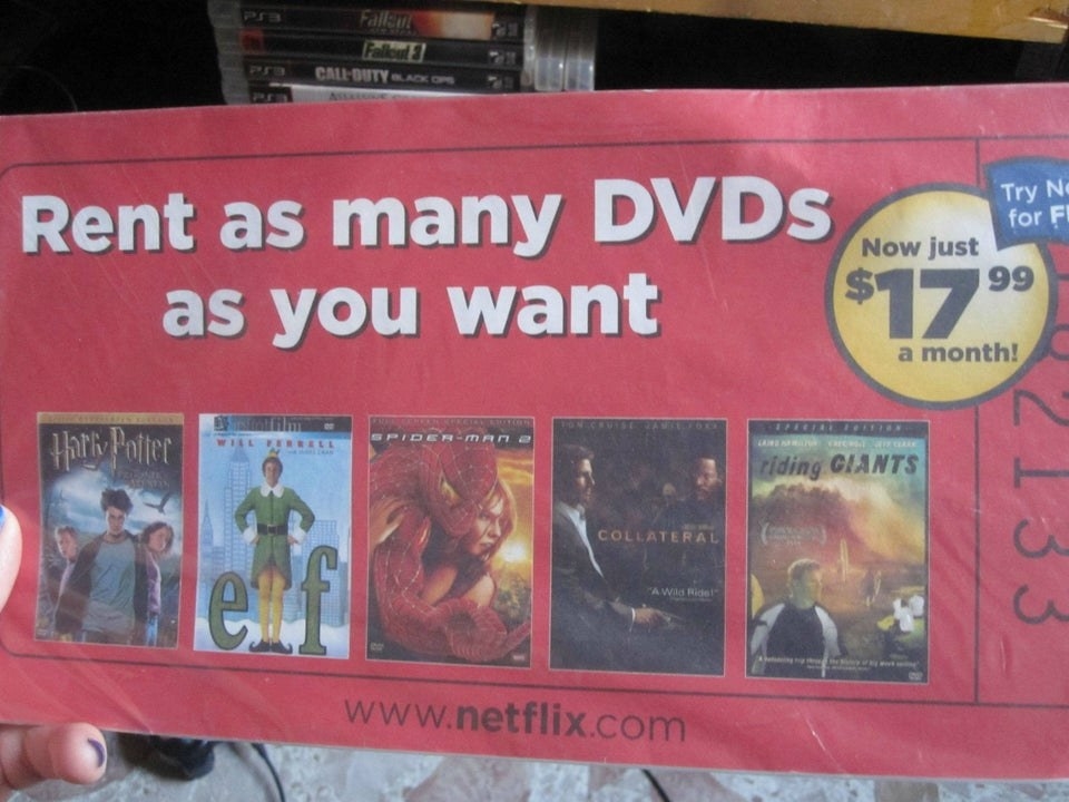 A red Netflix flier promoting irs DVD rental program for $17.99 a month. 