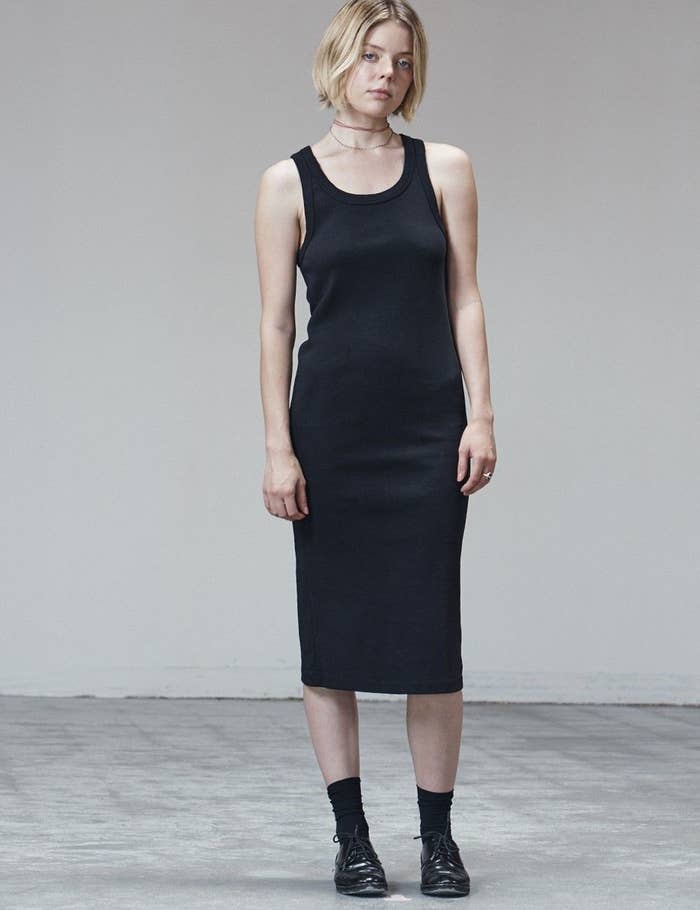 Model wearing midi-length tank dress in black