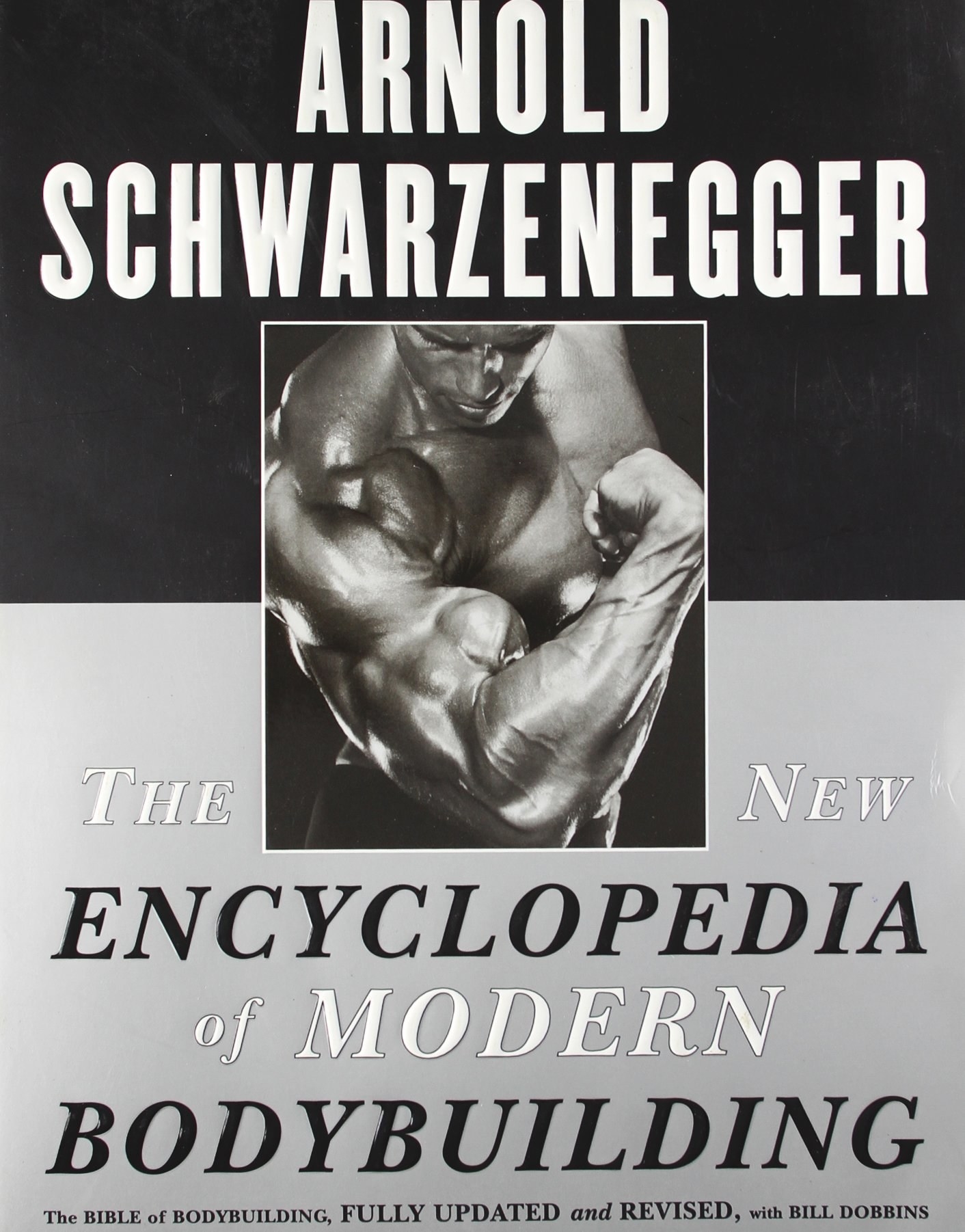 The cover of the book, showing young Arnold Schwarzenegger flexing his bicep