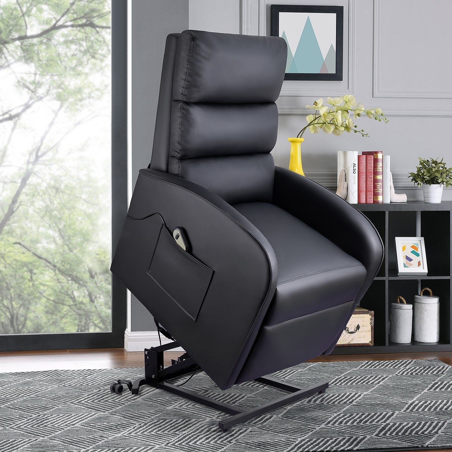 A black faux-leather chair positioned to allow someone to stand up easily