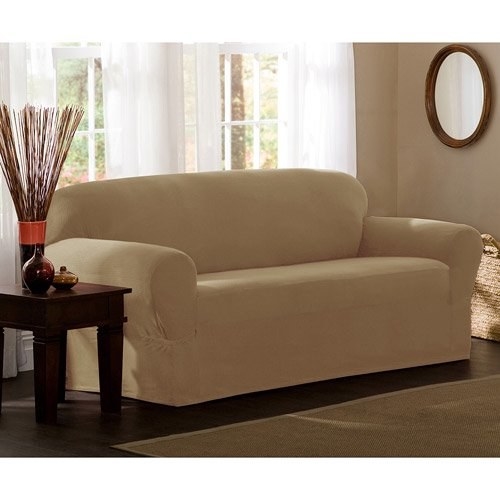 A tan-colored sofa slipcover