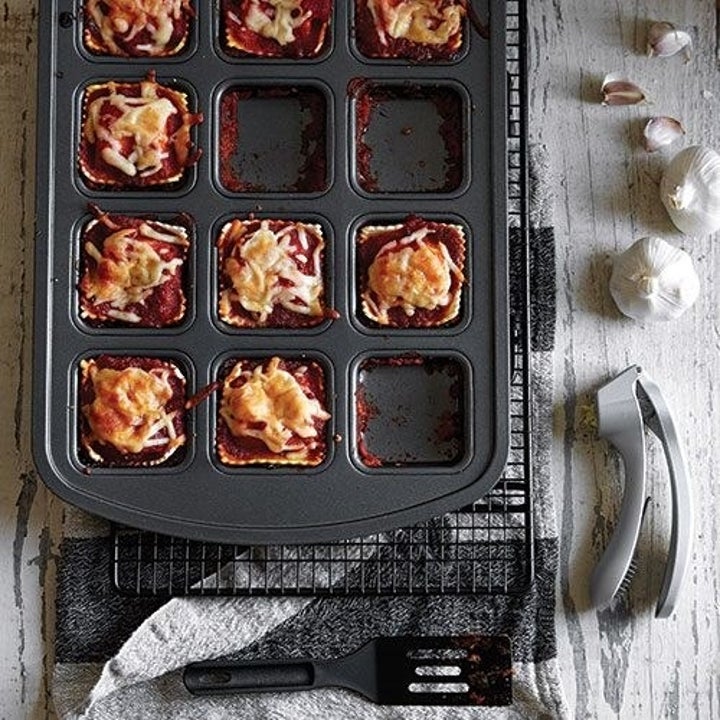 the pan with mini lasagnas in it