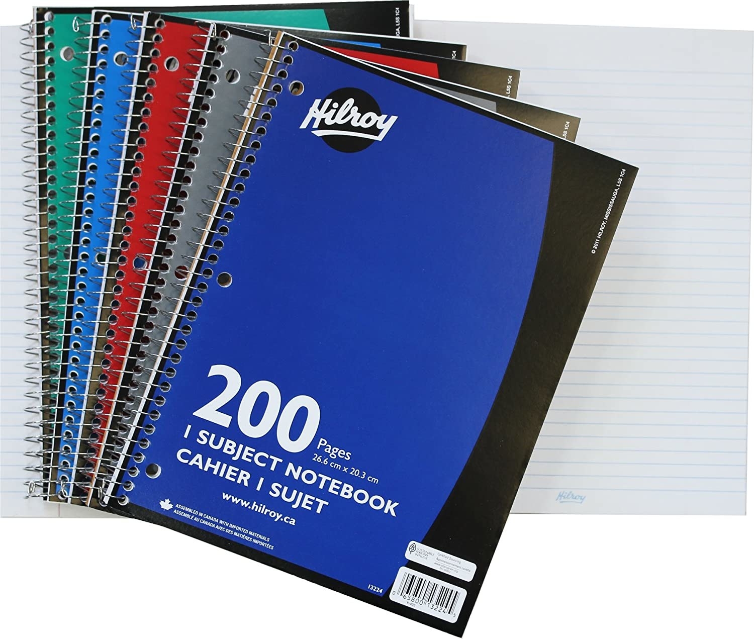 Notebooks stacked on top of each other with a wire binding