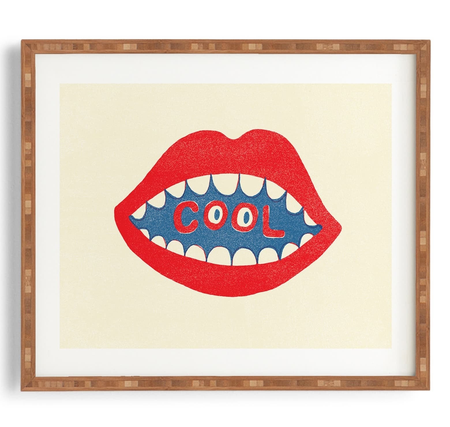 Framed wall art with an illustration of lips and teeth with the word "cool" in the middle