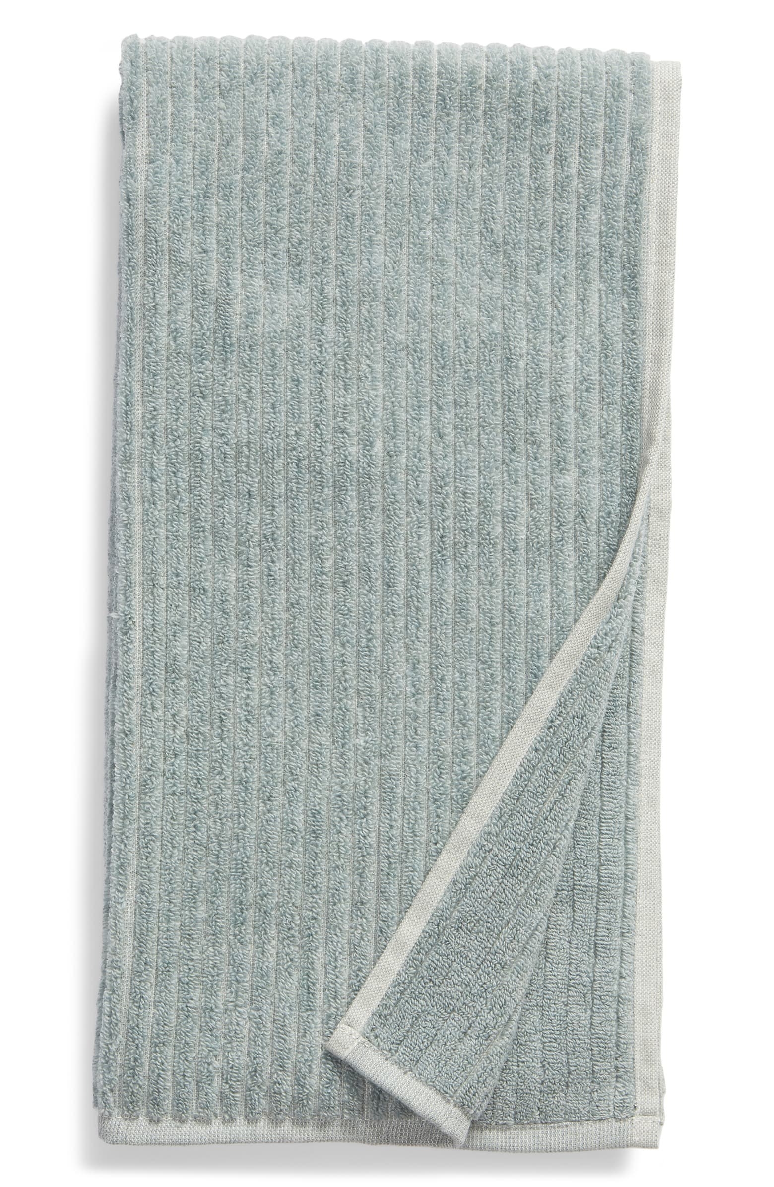The ribbed hand towel with vertical lines in teal