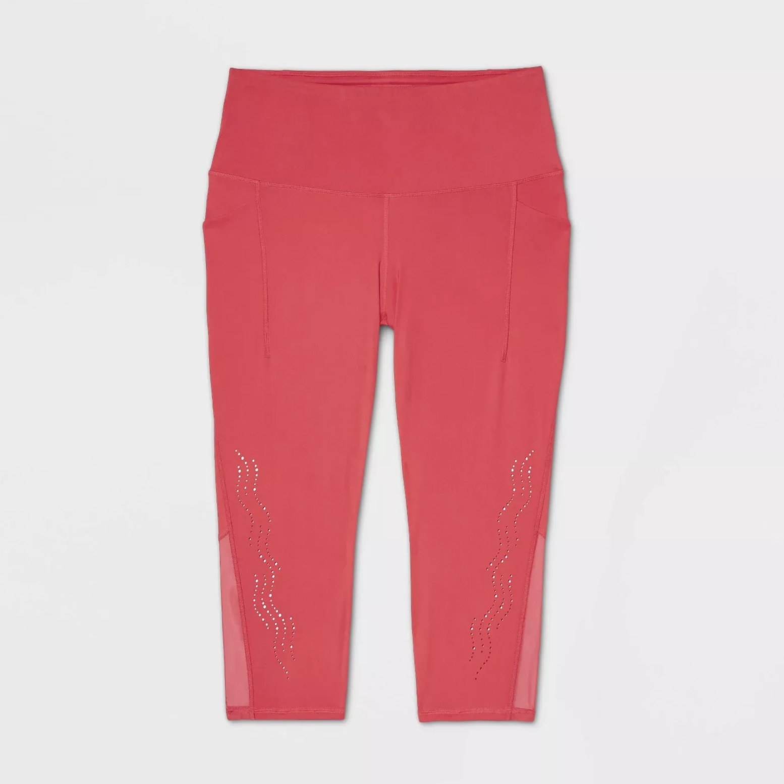 red high-waisted capri leggings with a laser-cut design and mesh on the calves