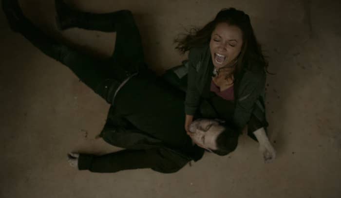 Bonnie screaming and crying while holding Enzo's body