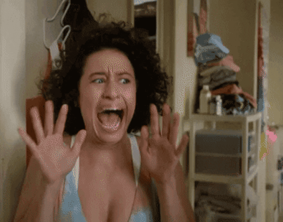 A gif of Ilana from Broad City screaming in fear