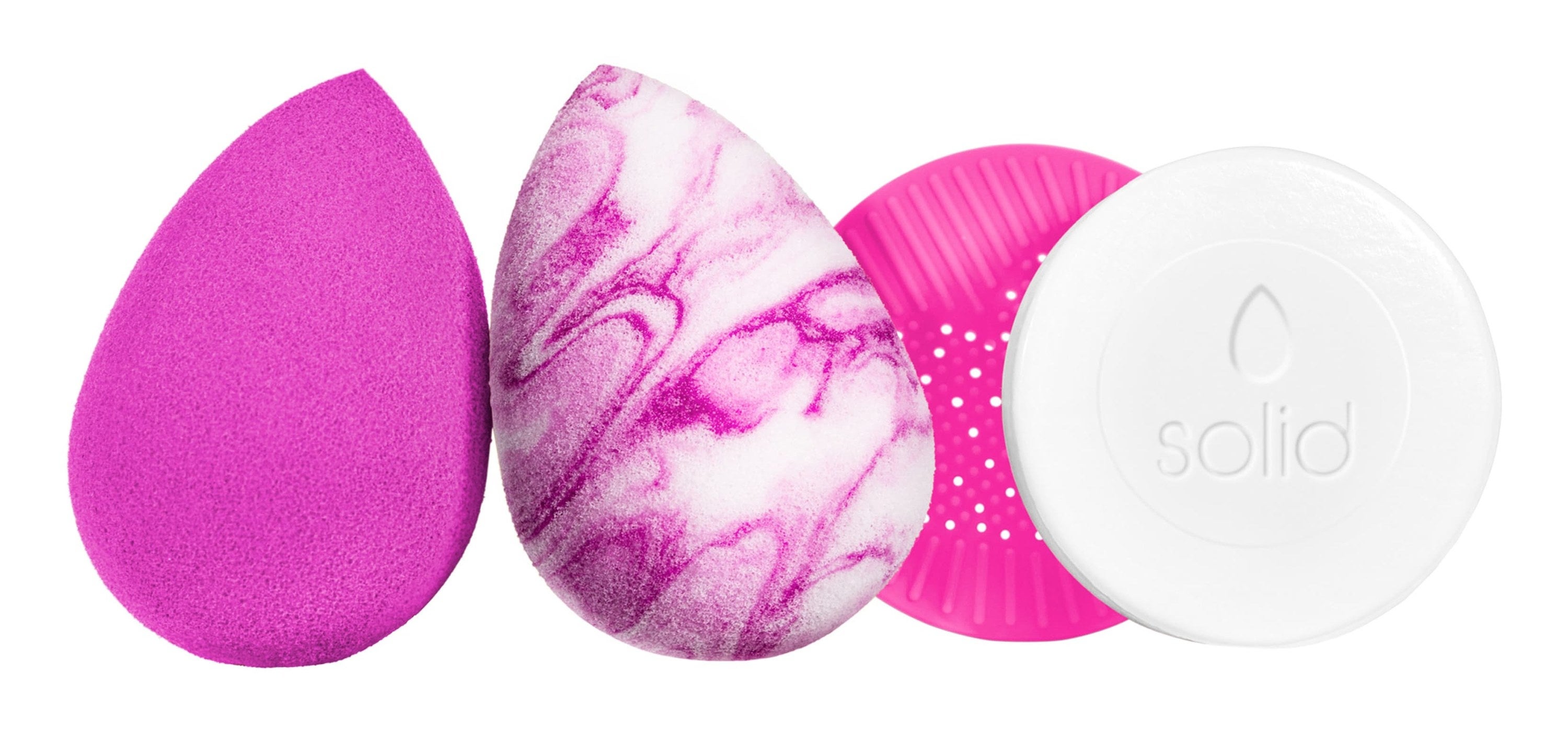 A pink sponge, a marbled pink sponge and the round solid cleanser