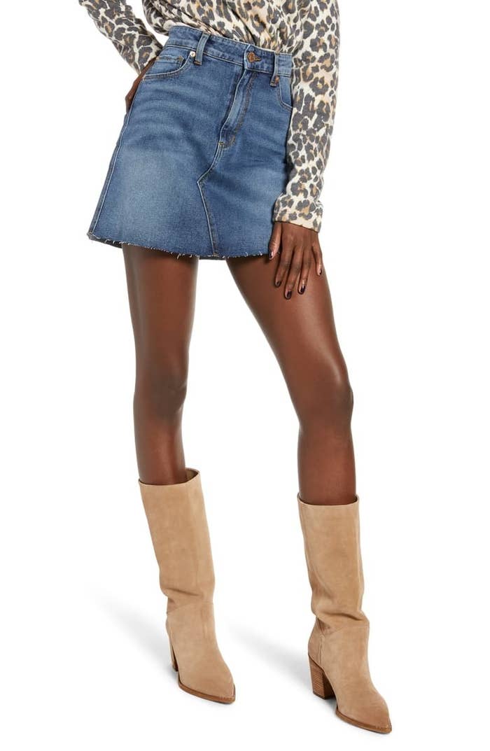 A model wears the STS Blue Emily stretch denim miniskirt