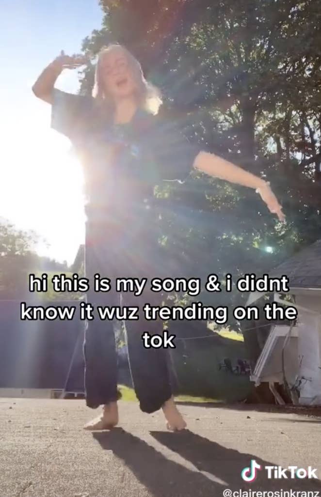 Claire with text saying, "Hi this is my song and I didn't know it was trending on the Tok"
