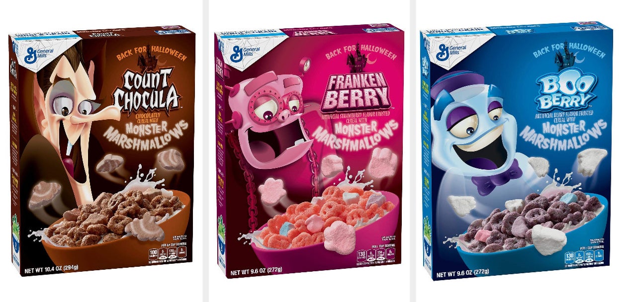 A brown box of Count Chocula, a pink box of Franken Berry, and a blue box of Boo Berry