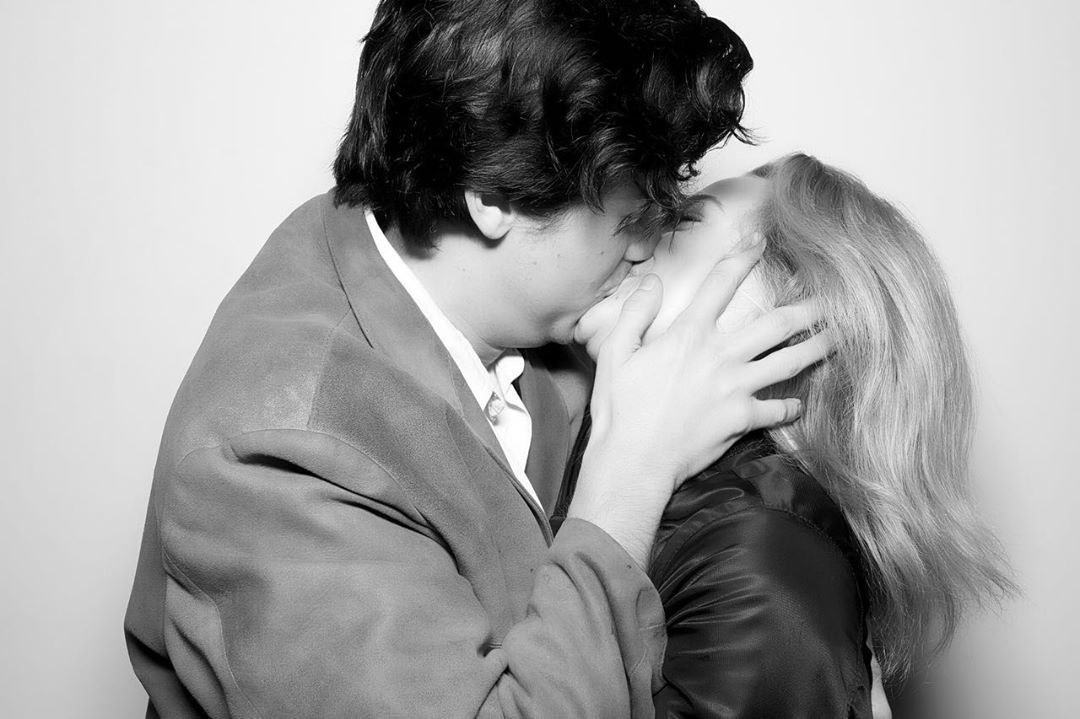 Cole Sprouse and Lili Reinhart embrace in a passionate kiss