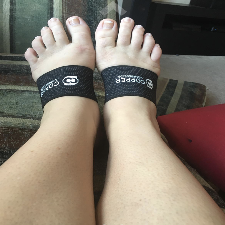 Reviewer image of them wearing both bands on feet