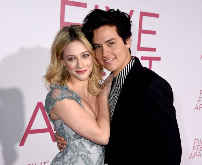 Lili Reinhart and Cole Sprouse posing together at a Hollywood event