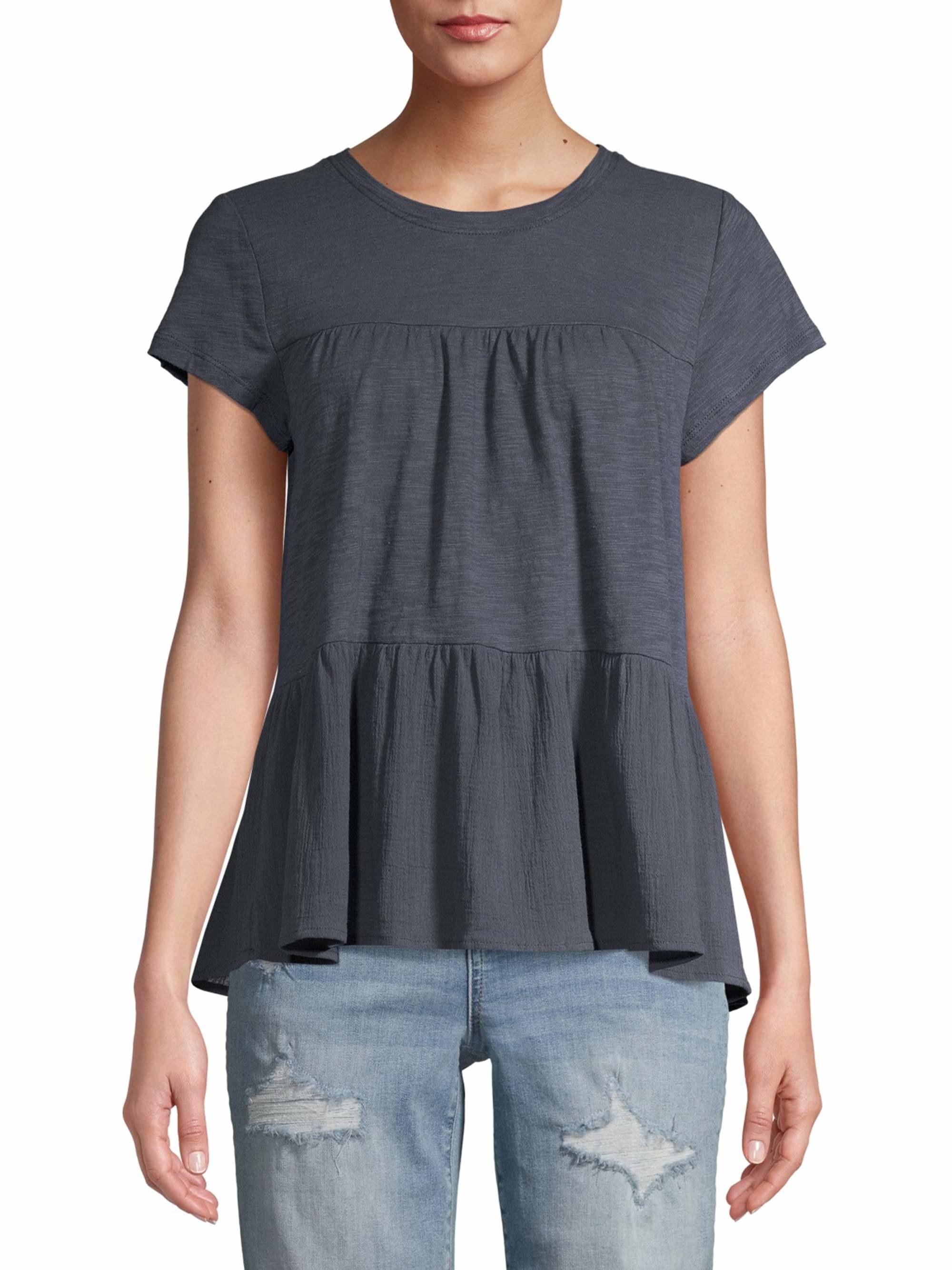 Model in a gray tiered t-shirt 