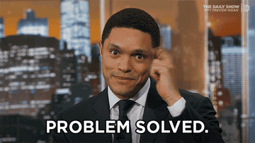 GIF of Trevor Noah saying “problem solved”.