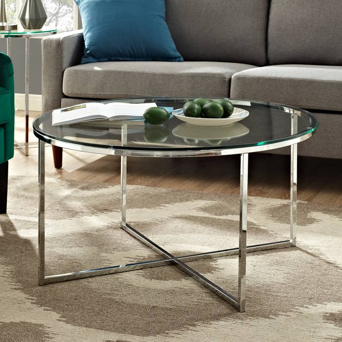 the chrome and glass rounded coffee table