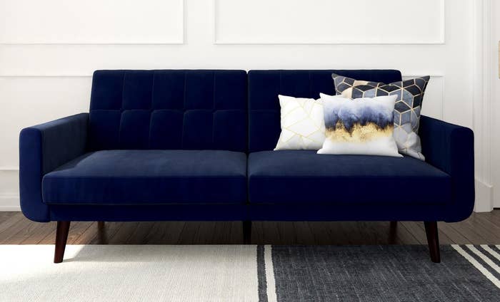 a velvet blue couch
