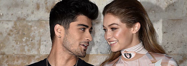 Zayn and Gigi at a black tie event looking longingly into each other's eyes