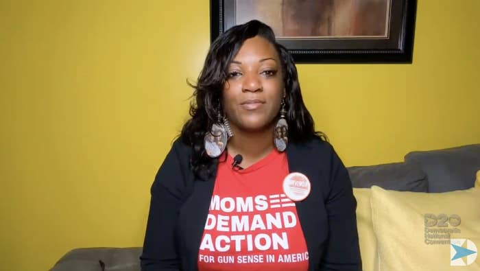 DeAndra Dycus addresses the DNC from home wearing a red "Moms Demand Action" T-shirt