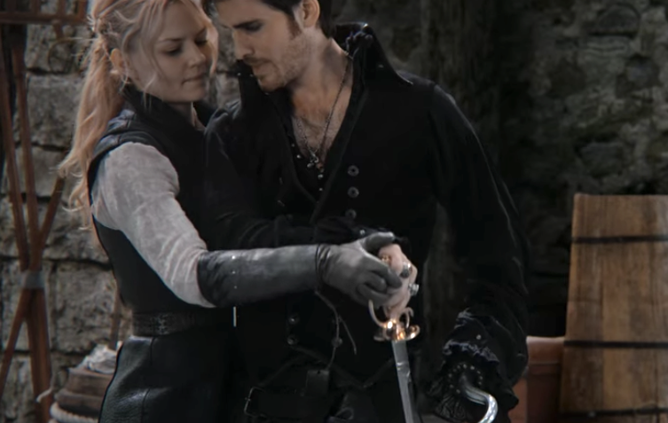 Emma behind Hook pulling out his sword