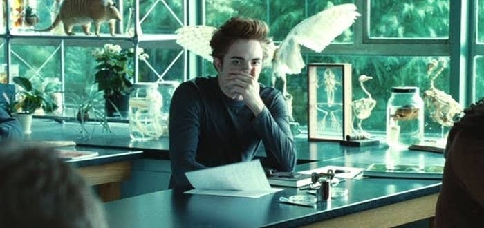 Edward covering his face as if Bella forgot to shower or something