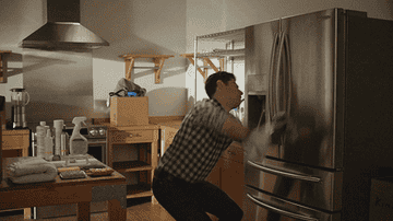 schmidt from new girl dancing and cleaning 