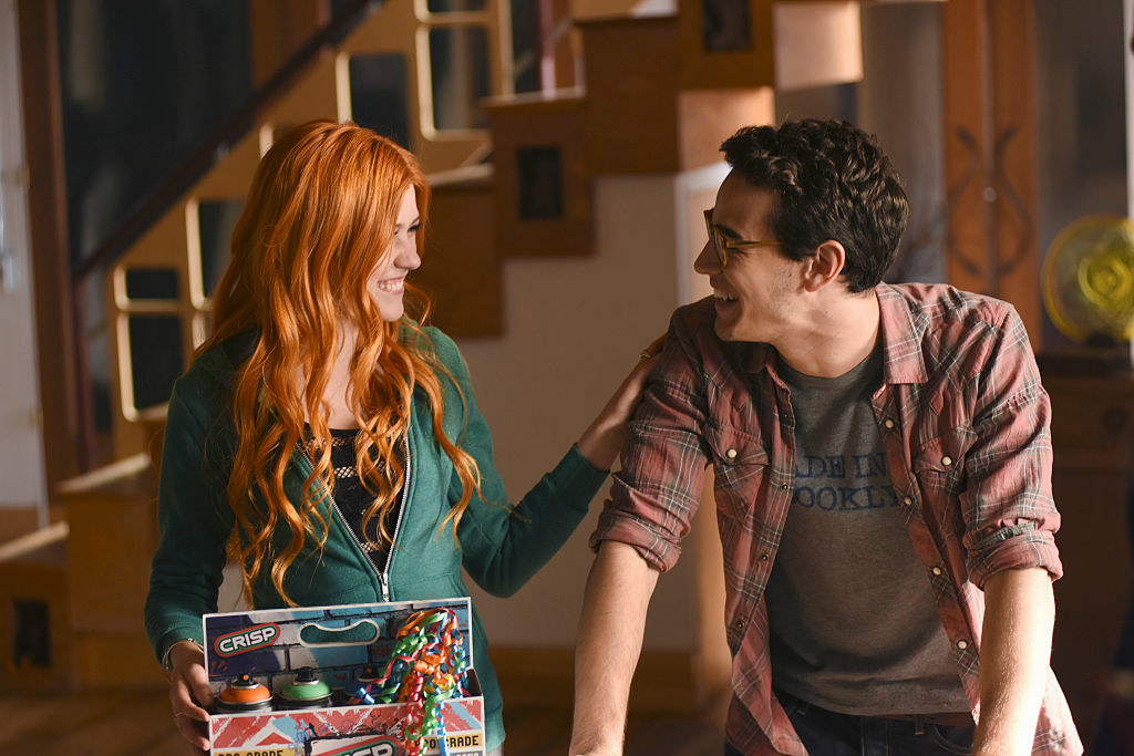 Kat McNamara and Alberto Rosende laughing while on set of &quot;Shadowhunters&quot;