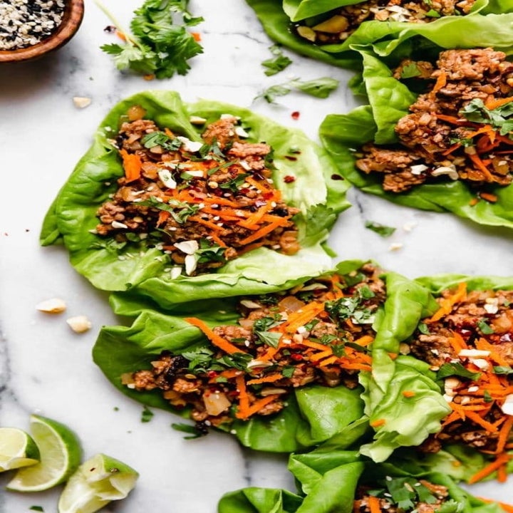 Chinese-inspired lettuce wraps filled with pork and mushrooms.
