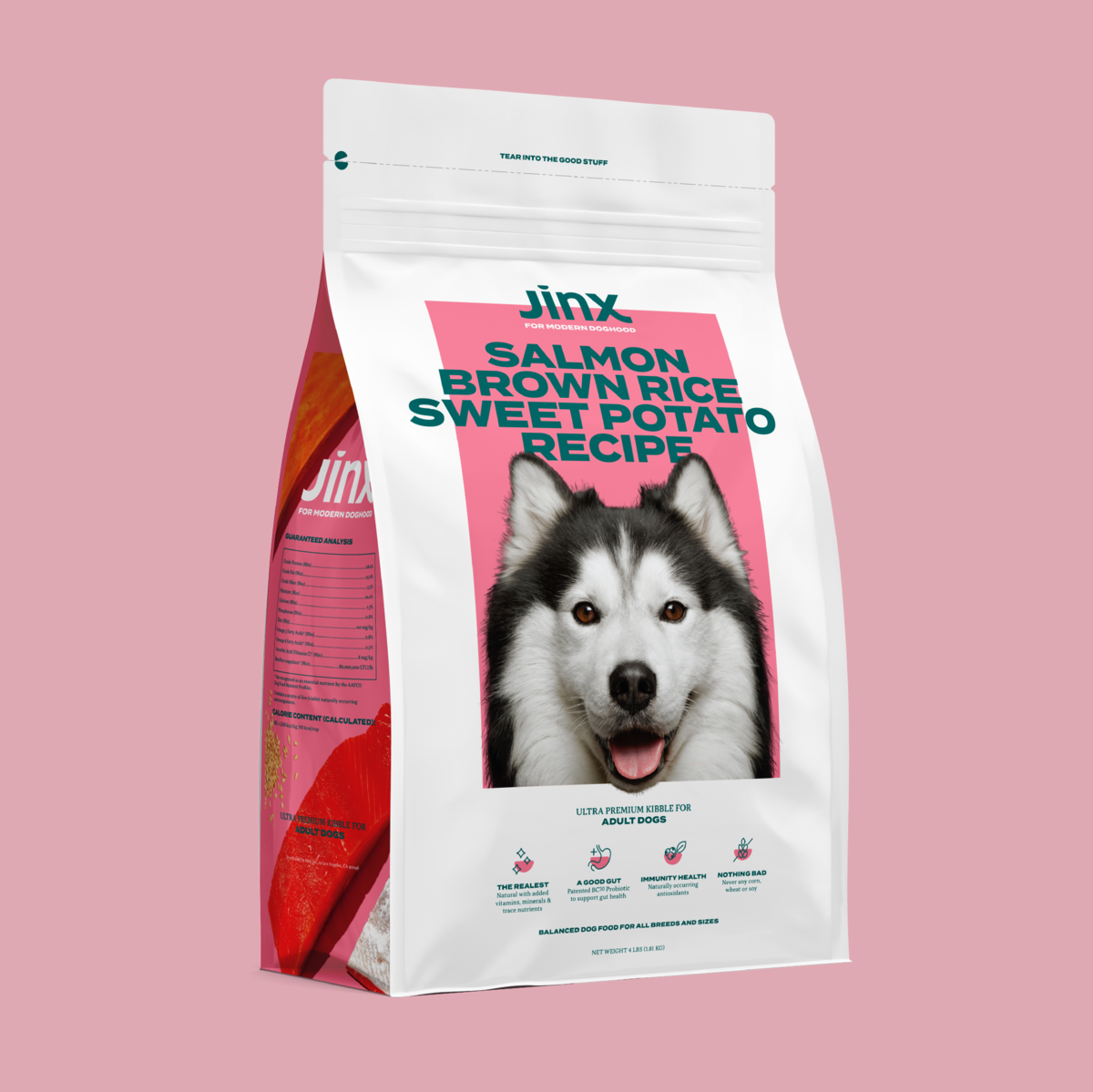 Pink and white bag of  salmon dog food with a Husky on the front