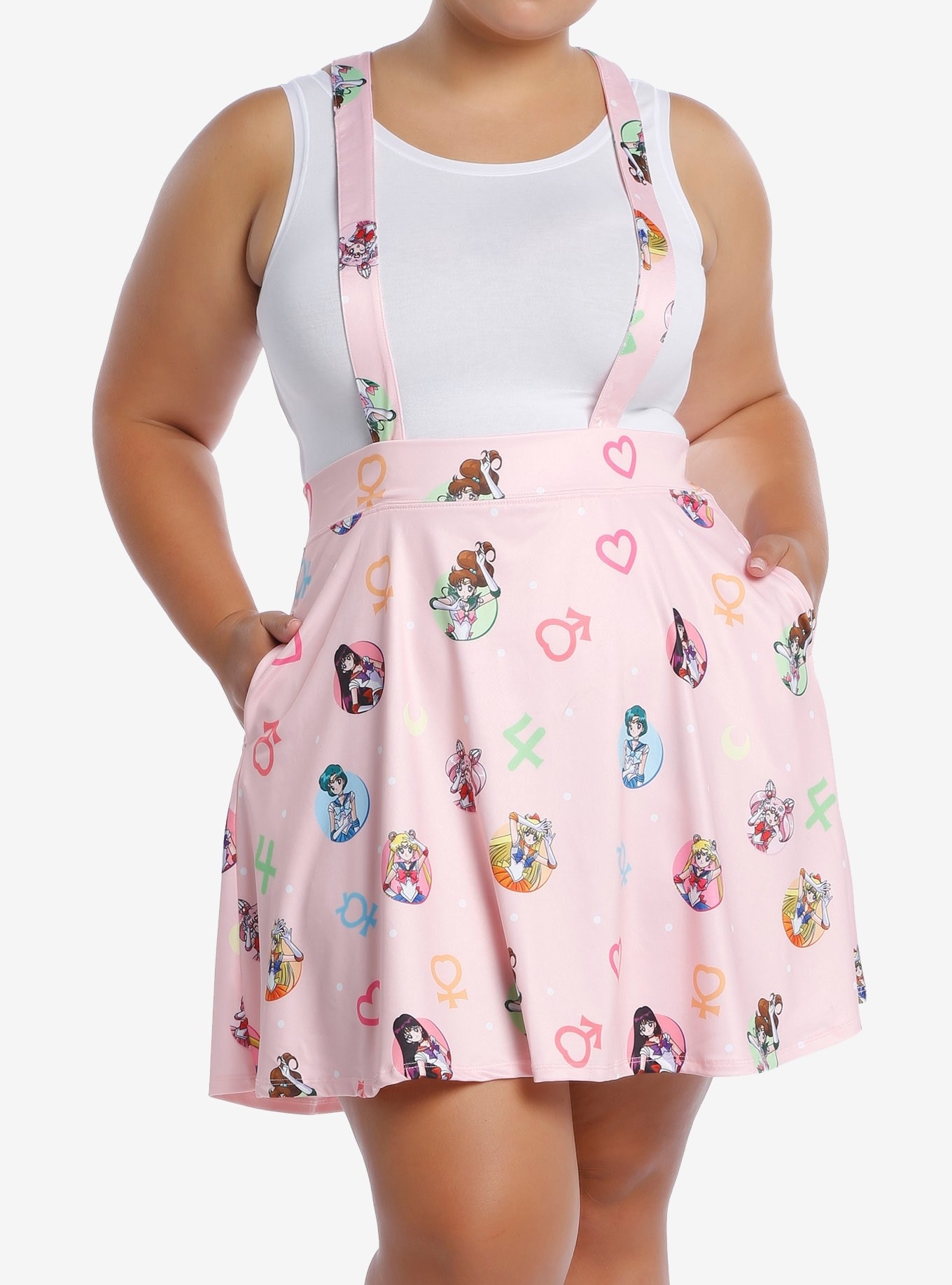 Model wearing a pink suspender skirt with Sailor Moon images