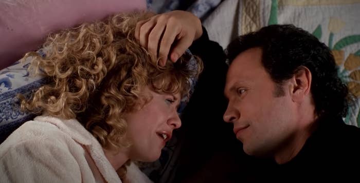 Harry and Sally lie in bed looking at each other while Sally cries in &quot;When Harry Met Sally.&quot;