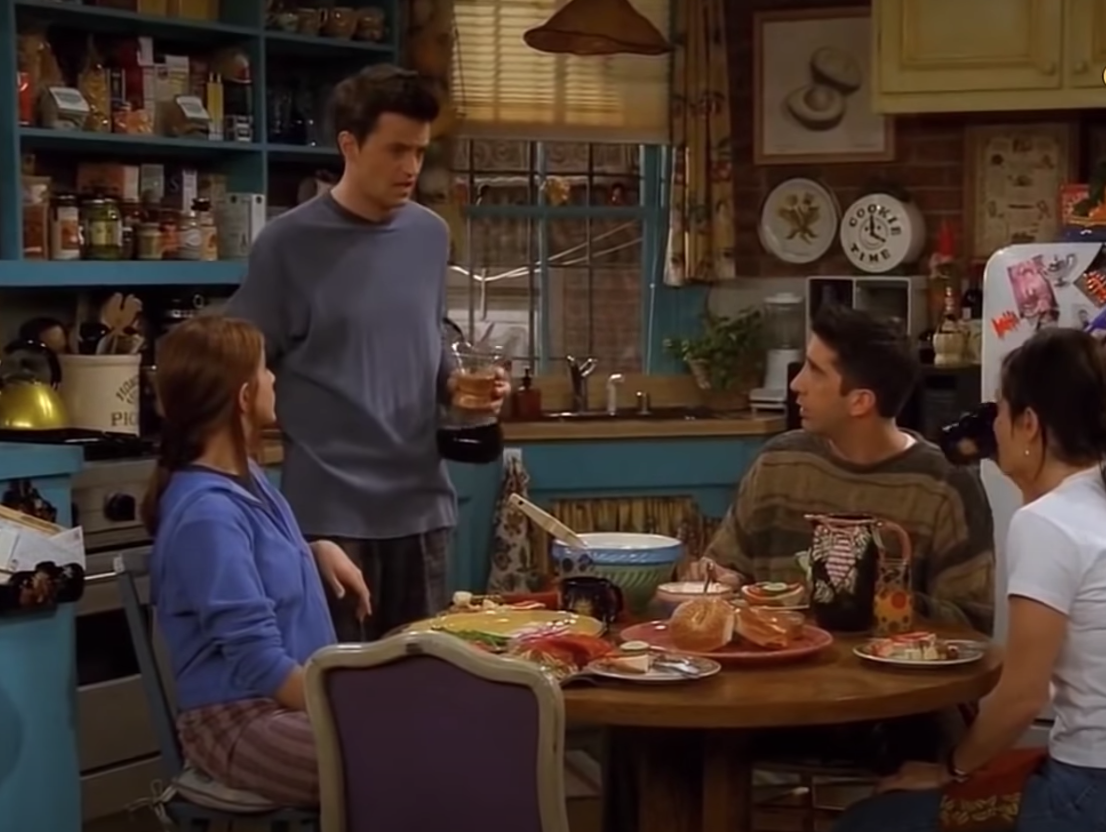 The &quot;Friends&quot; cast sits around Monica&#x27;s kitchen table. 
