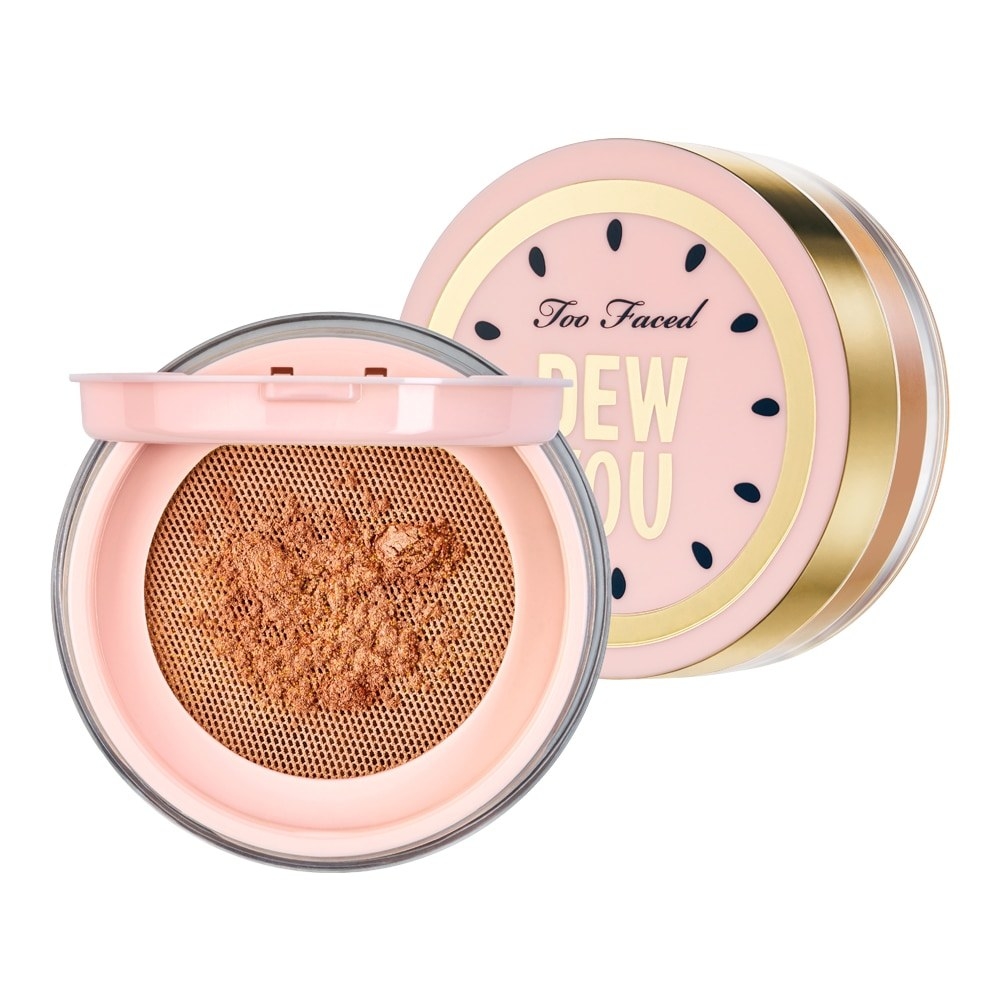 A round pink and gold container of setting powder opened and closed