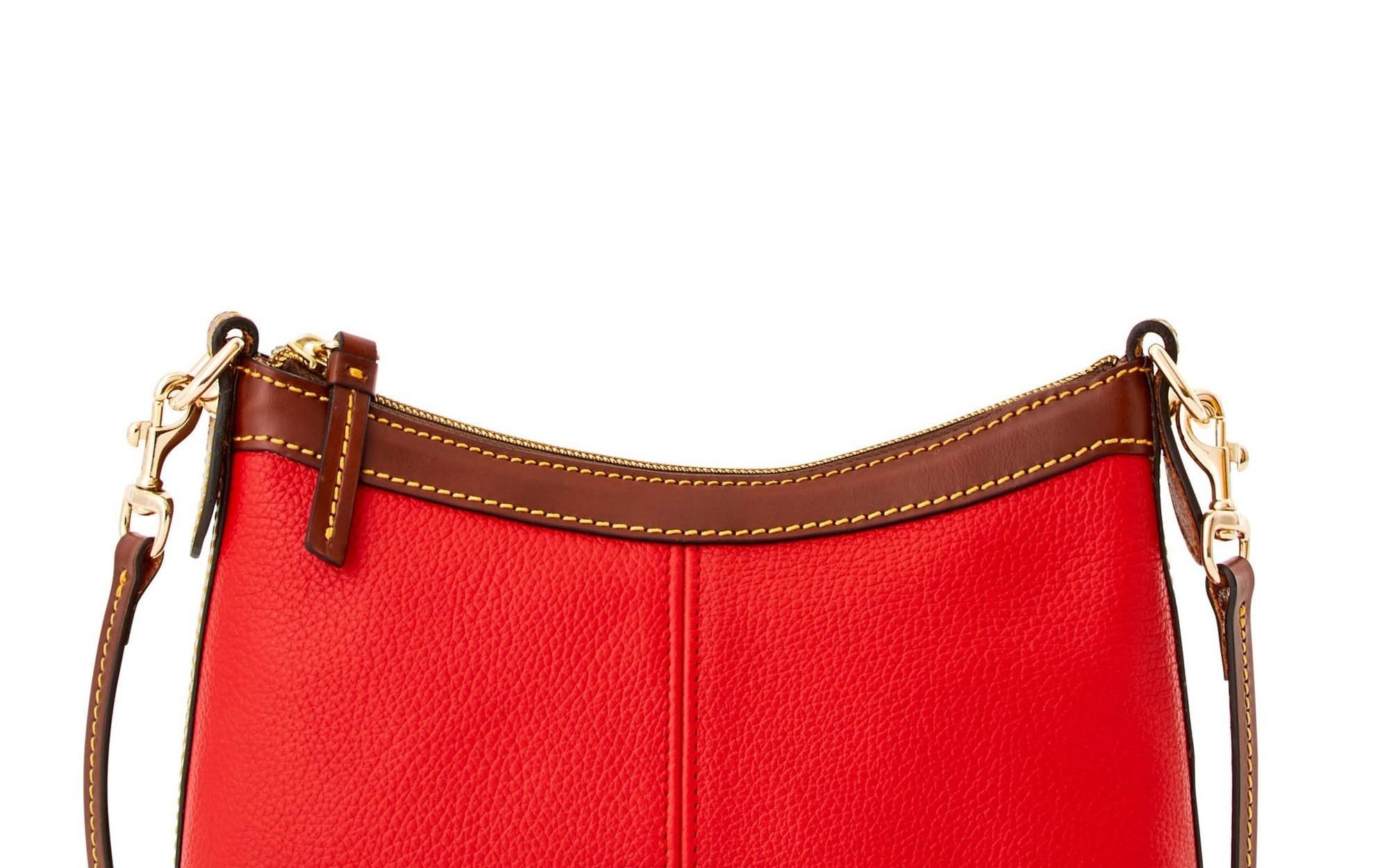 A bright red leather crossbody pouch