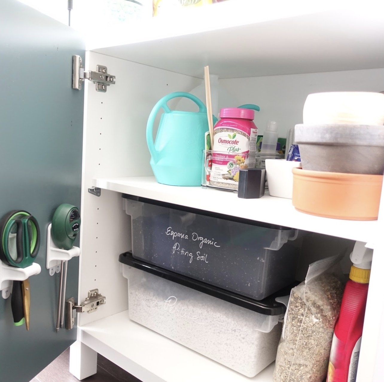 A cabinet of gardening supplies