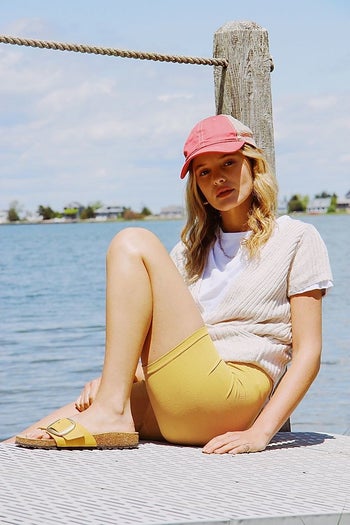 Model in yellow bike shorts 