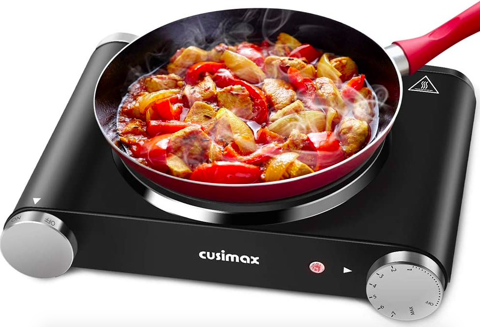 Cusimax black portable hot plate with a red pan cooking sausage and peppers on top