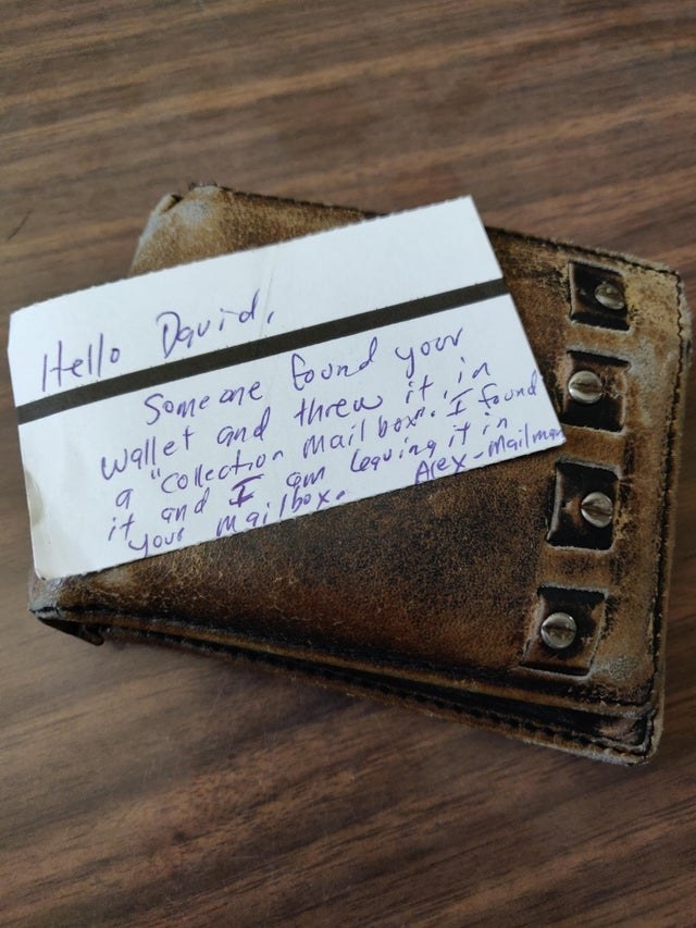 picture of a note from a mailperson about a found wallet