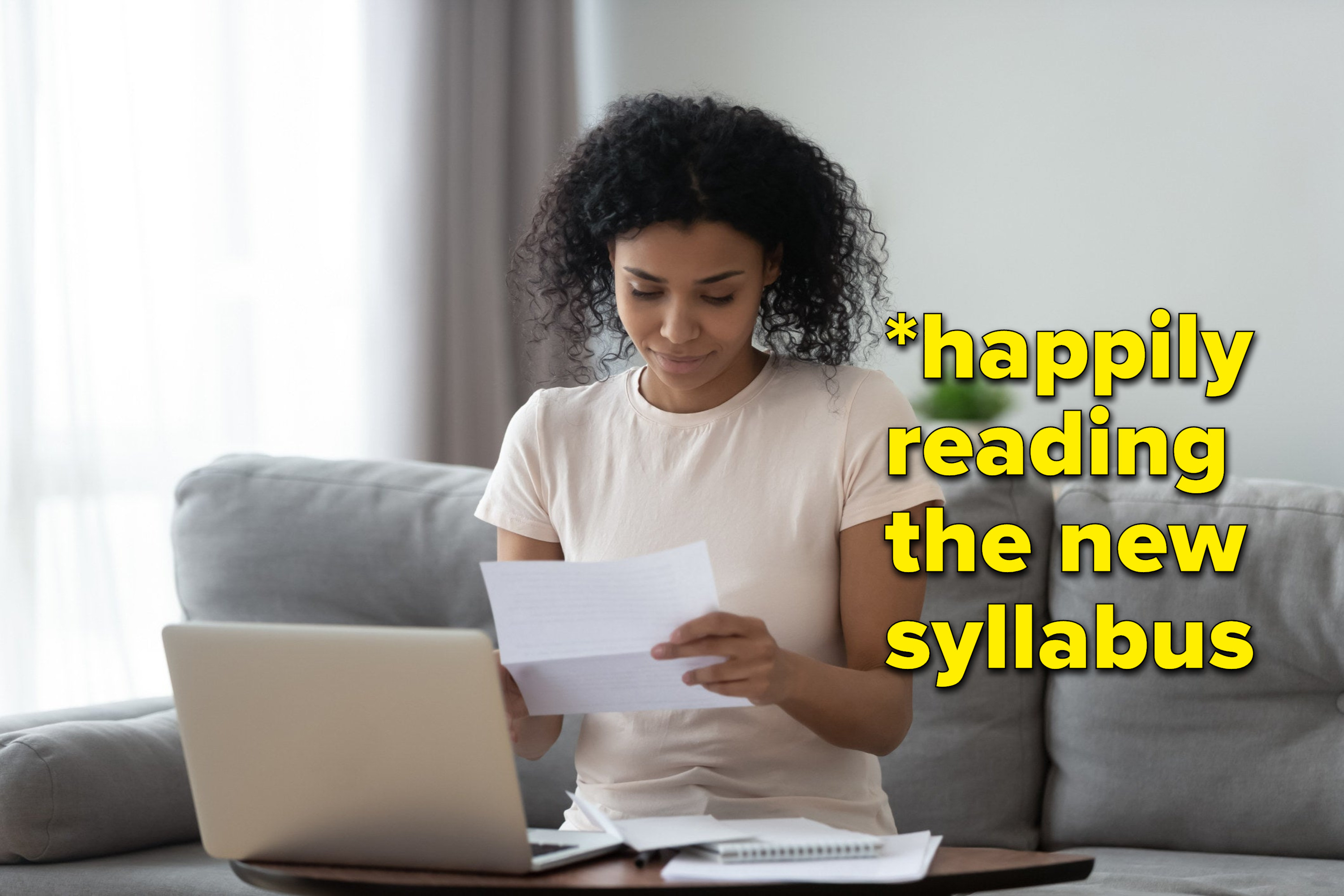 A student reads a paper with the caption: &quot;happily reading the new syllabus&quot;