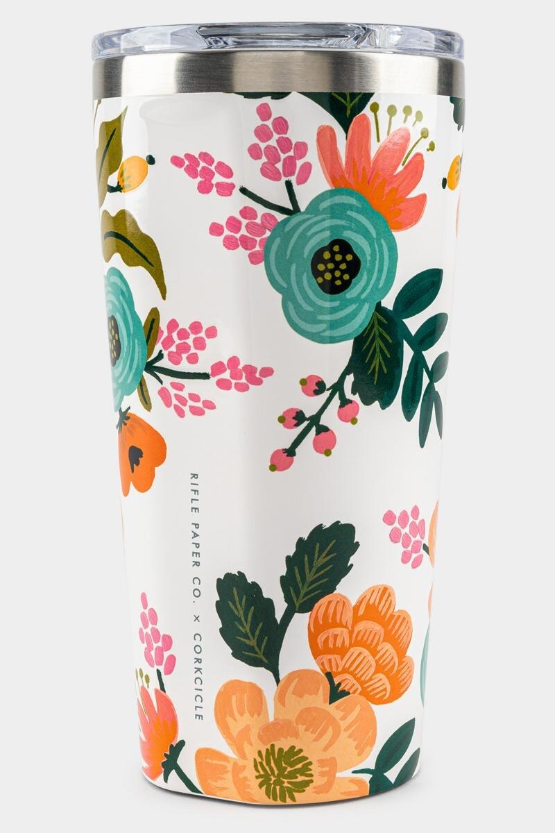 a tumbler with colorful florals on a white background 