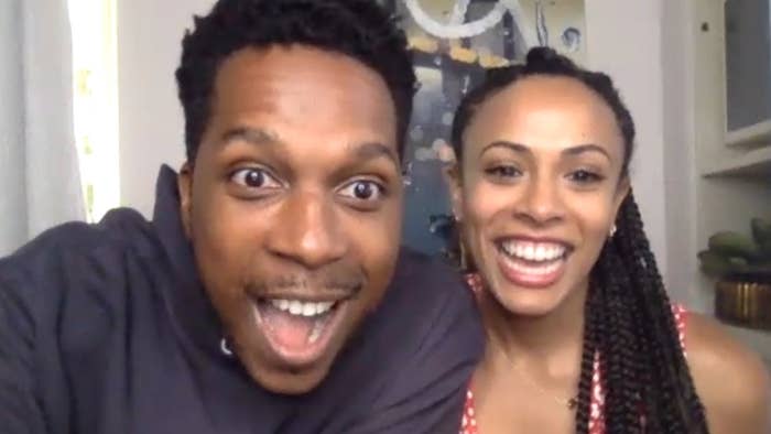 Leslie Odom Jr. and Nicolette Robinson looking excitedly into the camera. 