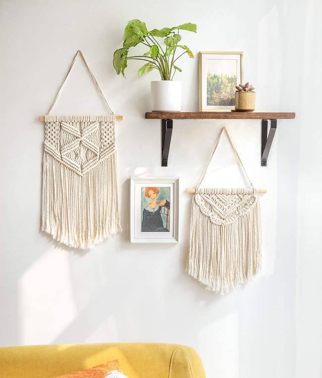 two small macrame tapestries on gallery wall