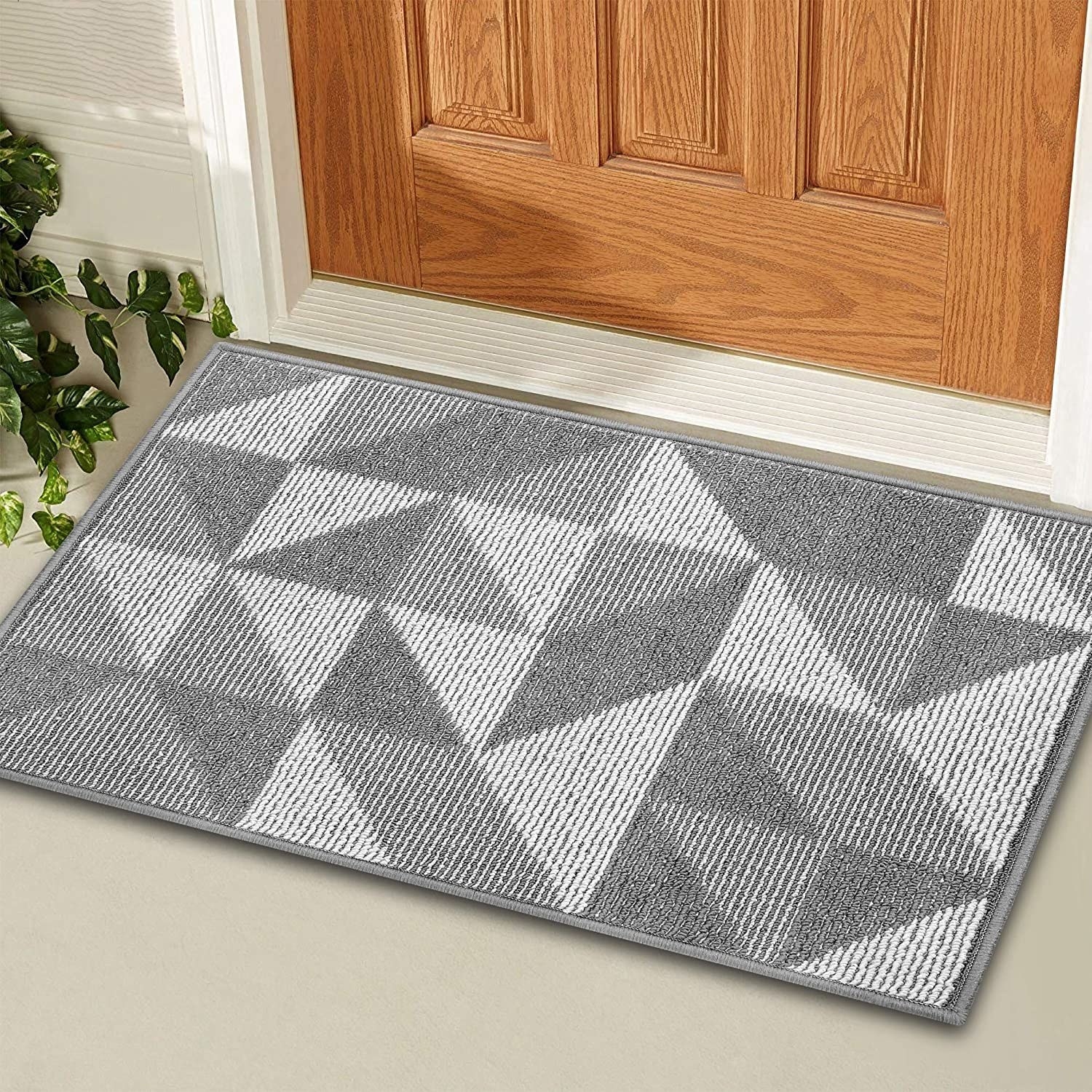inside door with gray geometric print mat
