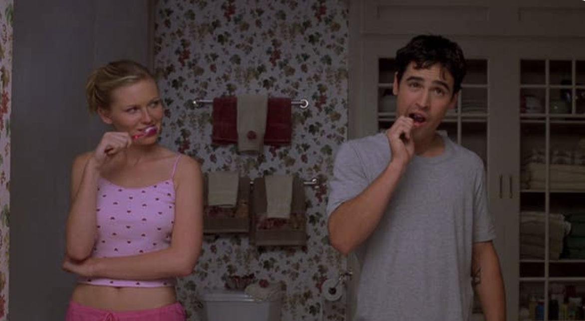 Two people brushing their teeth from the movie &quot;Bring It On&quot;.