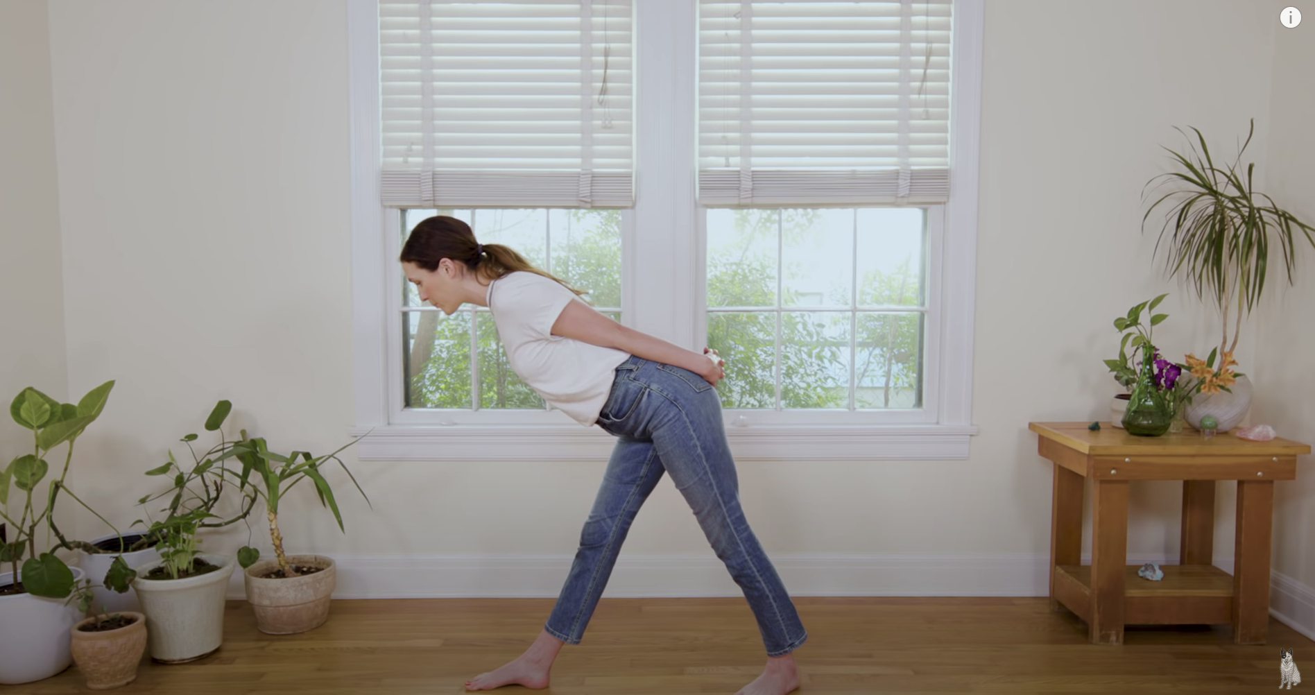 Screenshot of someone stretching from a &quot;desk yoga&quot; routine on YouTube.